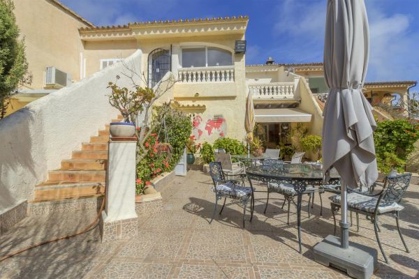 Bright two-story house with garden and large terrace in Costa de la Calma, Calvià, Mallorca, Balearic Islands.