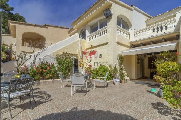 Bright two-story house with garden and large terrace in Costa de la Calma, Calvià, Mallorca, Balearic Islands.